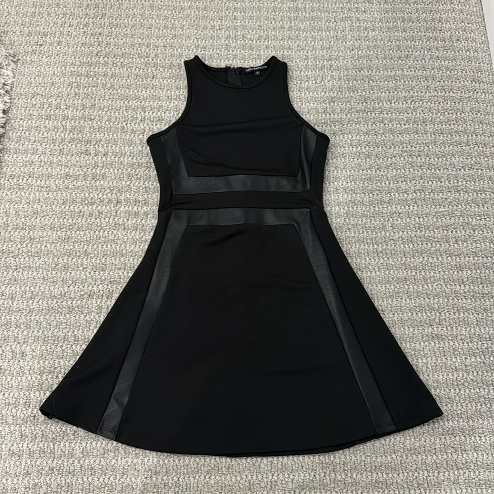 Leather and black dress